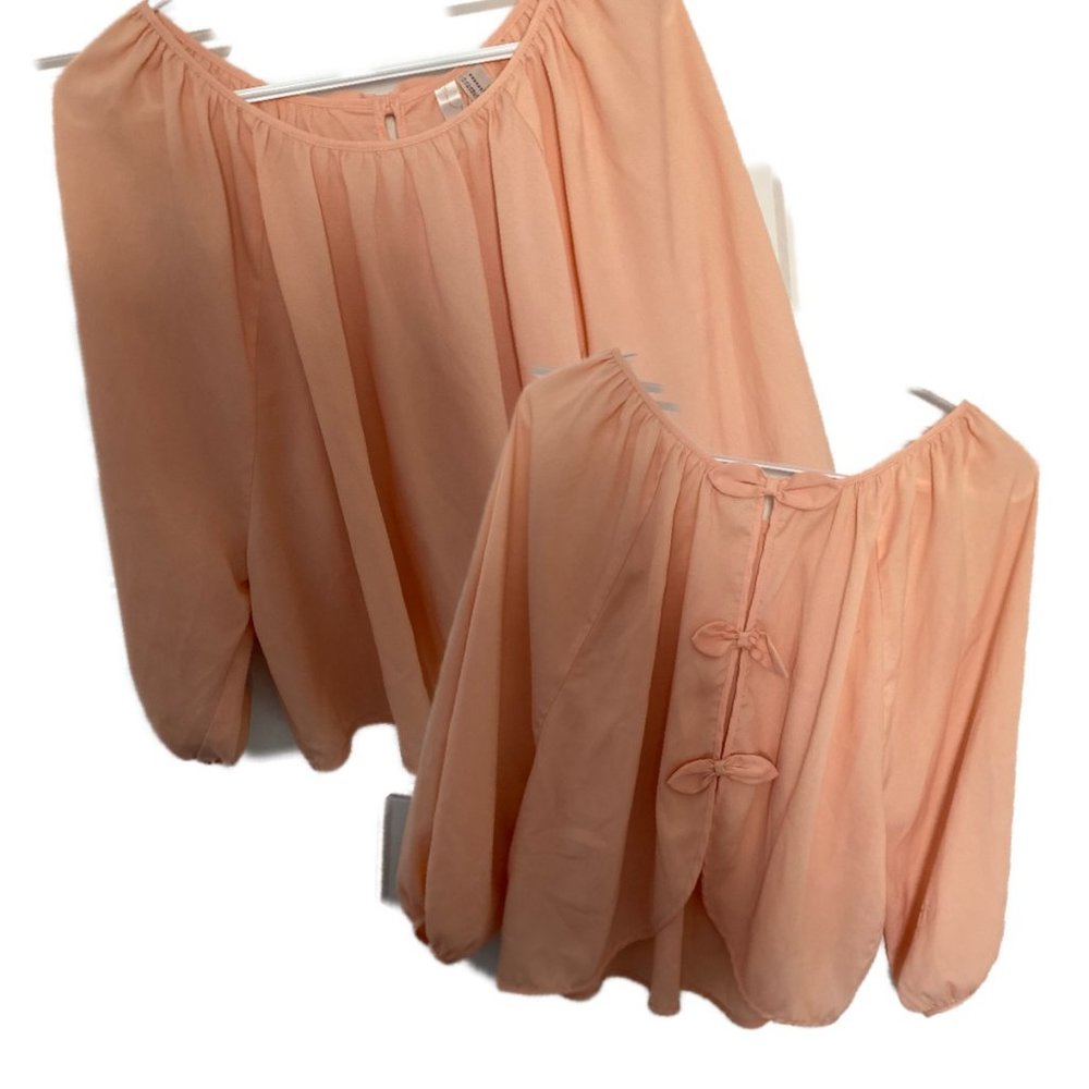 Flowy peach top with bow style back